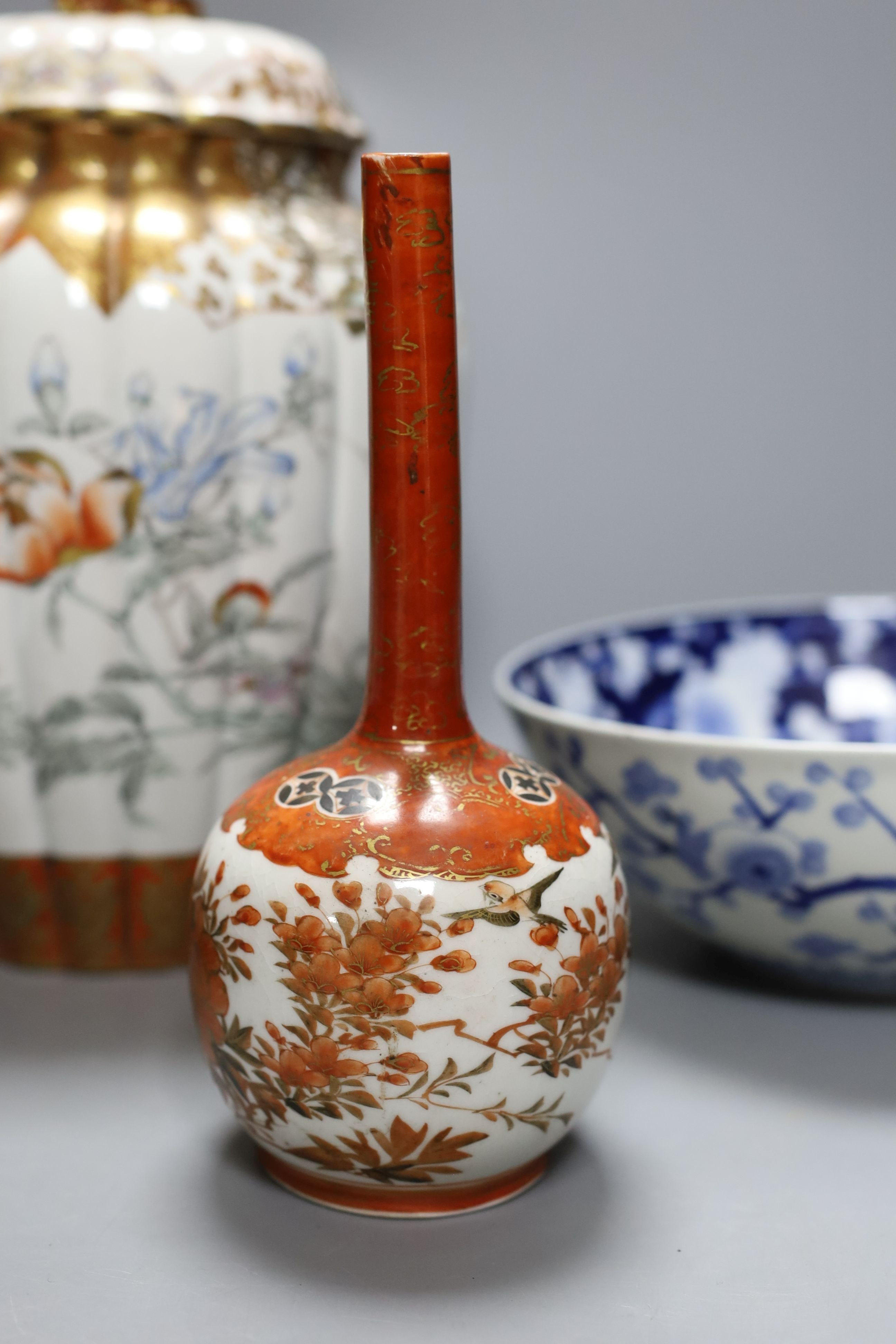 4 Chinese Qing dynasty coins, a Japanese kutani bottle vase, similar vase and cover (a.f), an Imari bowl and blue and white bowl. Largest 27cm